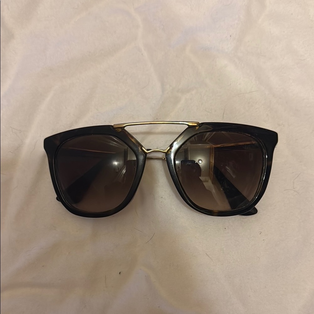 Prada Black and Gold Sunglasses with Classic Style